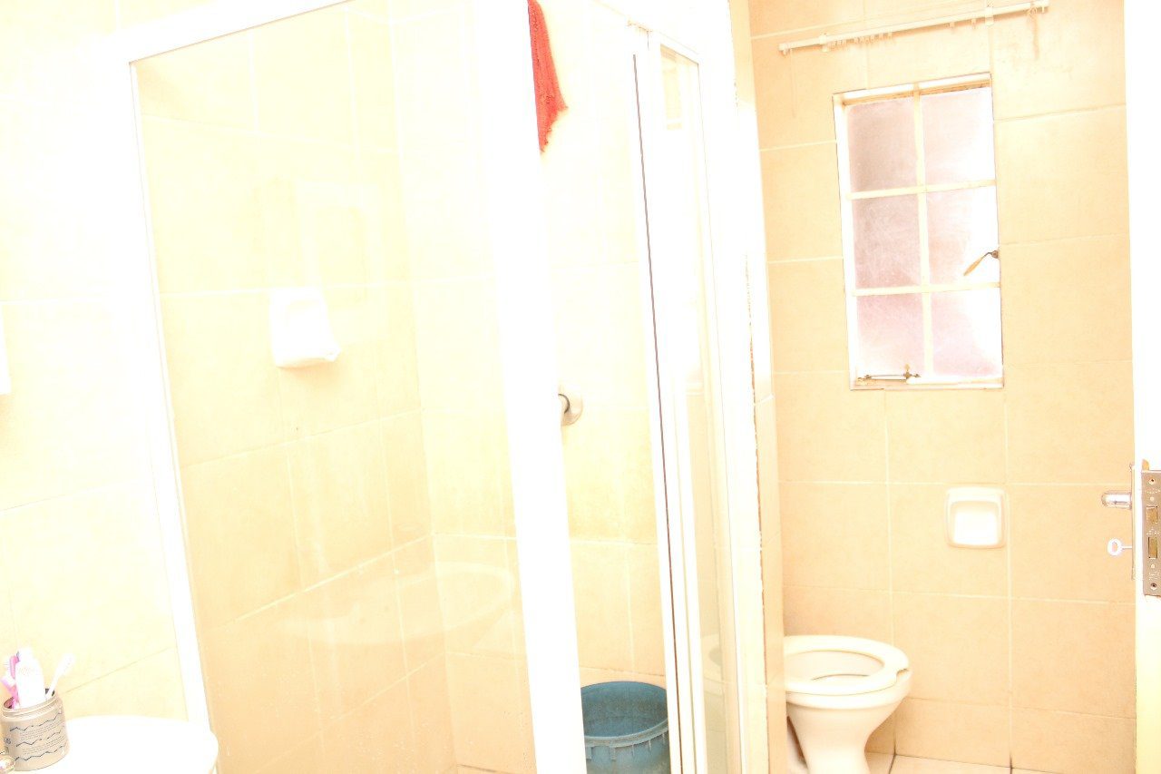 12 Introducing A stunning 2 bedroom apartment situated in a secured complex with 24 hr security in a quite area.